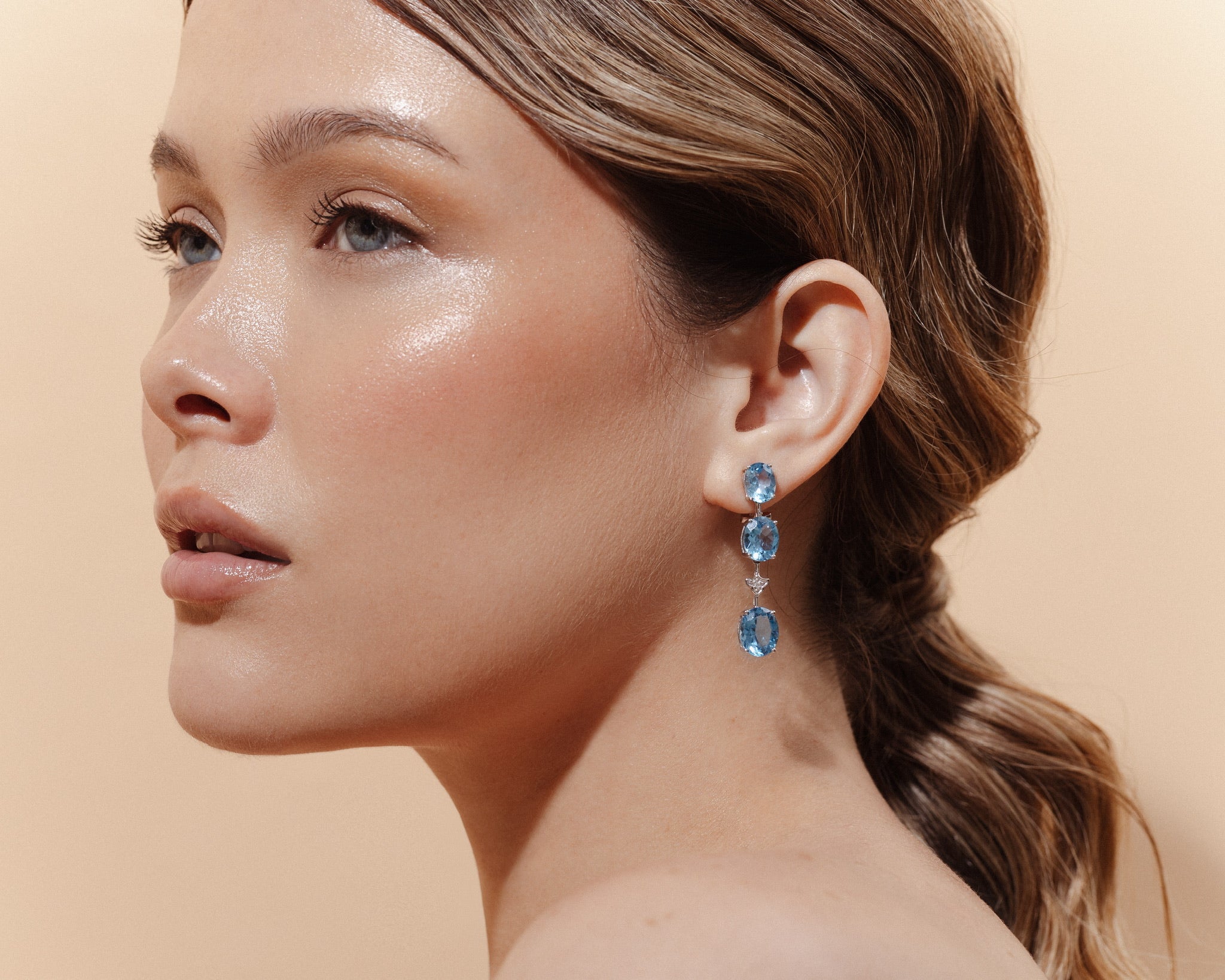 THREE OVAL BLUE TOPAZ EARRINGS