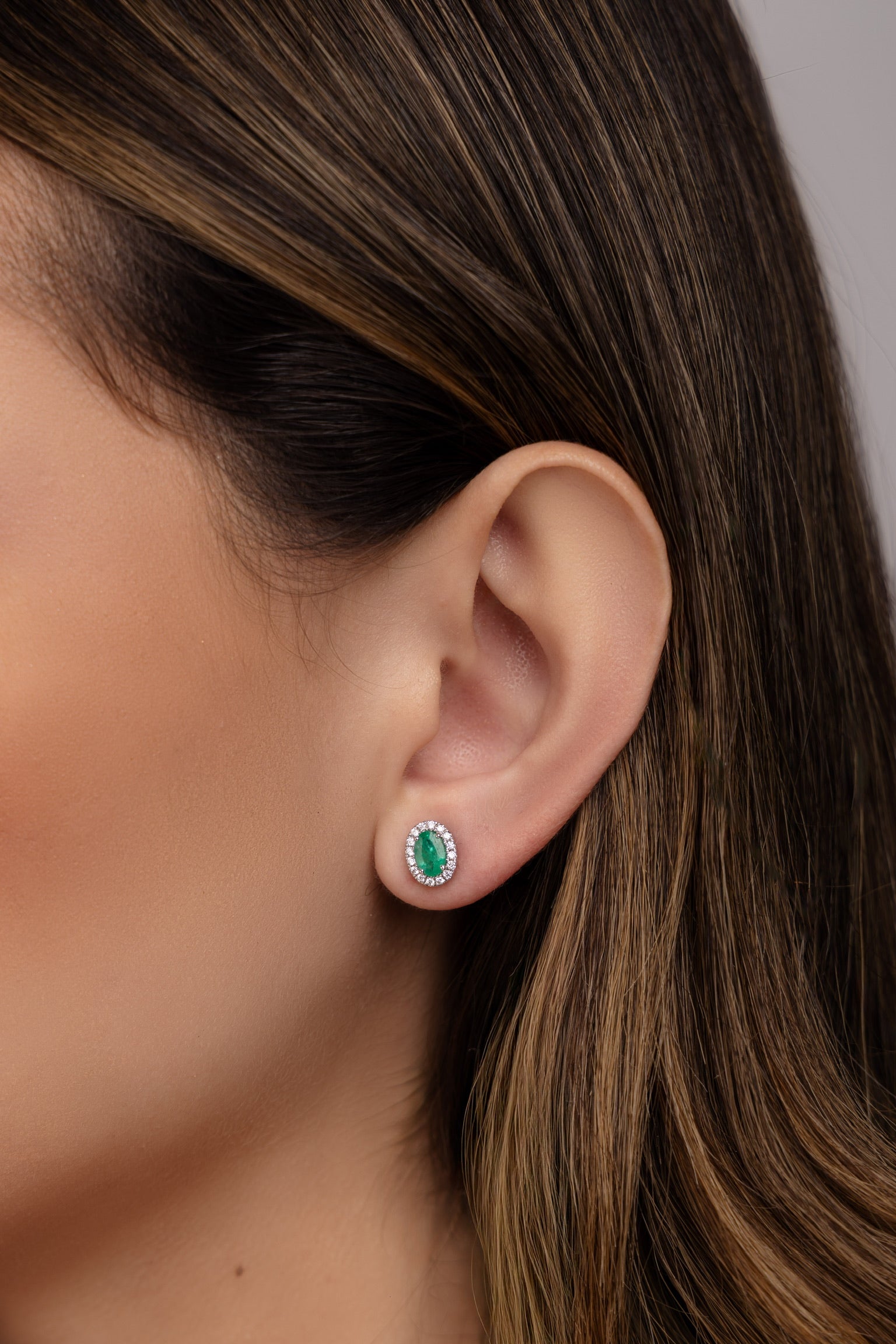 EMERALD STUDS WITH DIAMOND HALO