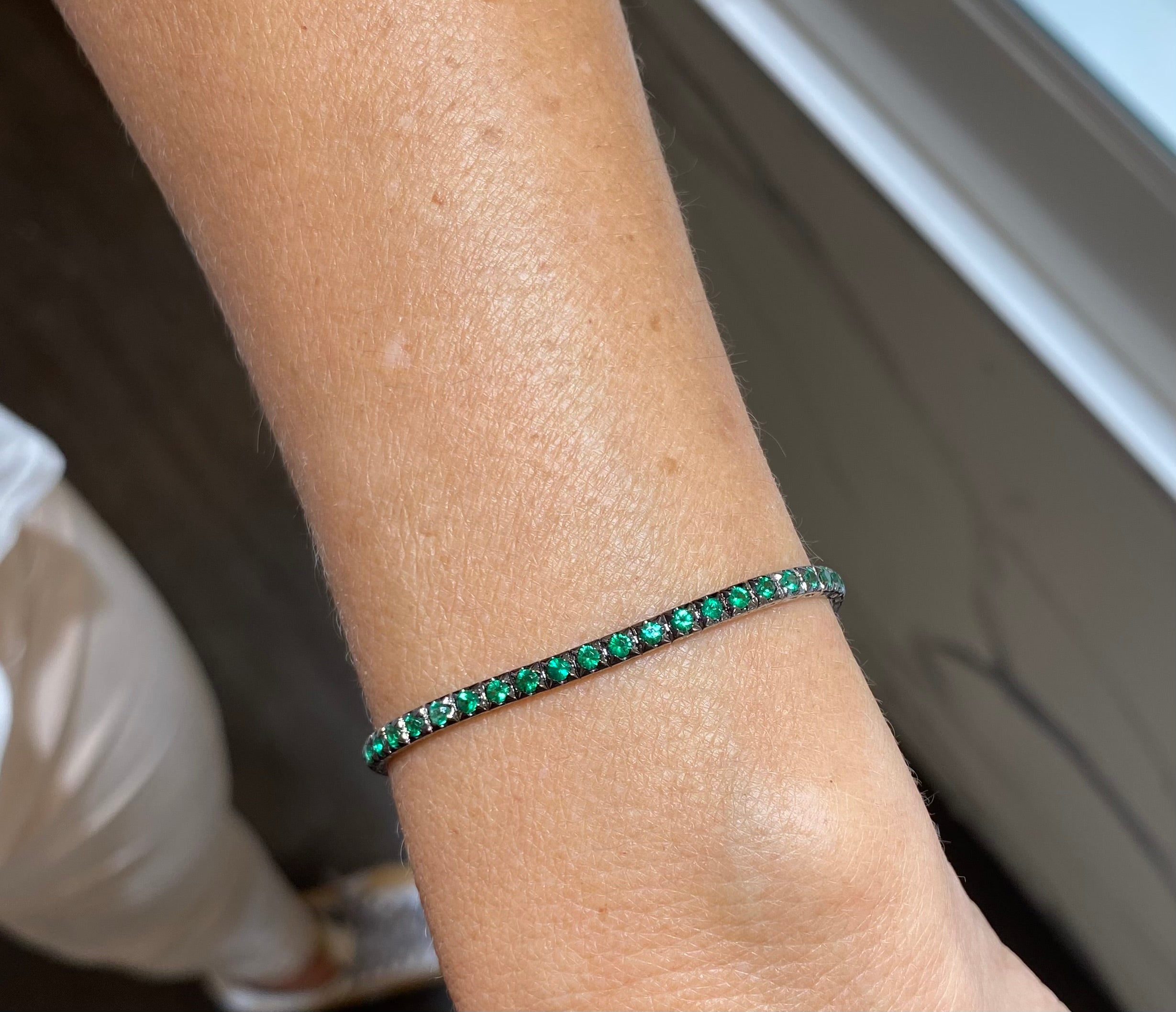 BLACK GOLD AND EMERALD BRACELET