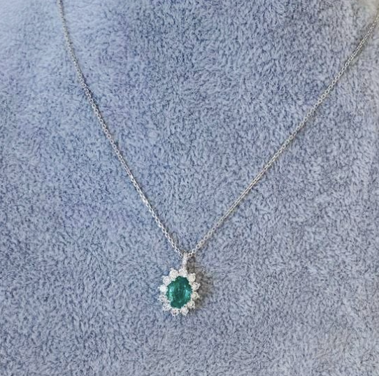 OVAL EMERALD PENDANT WITH DIAMOND HALO