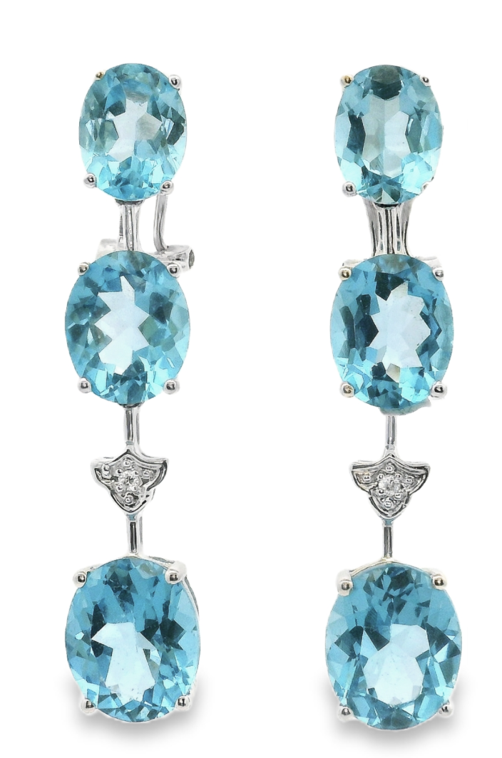 THREE OVAL BLUE TOPAZ IN WHITE GOLD